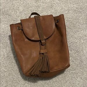 T-shirt & Jeans Brown Leather Backpack with Tassel